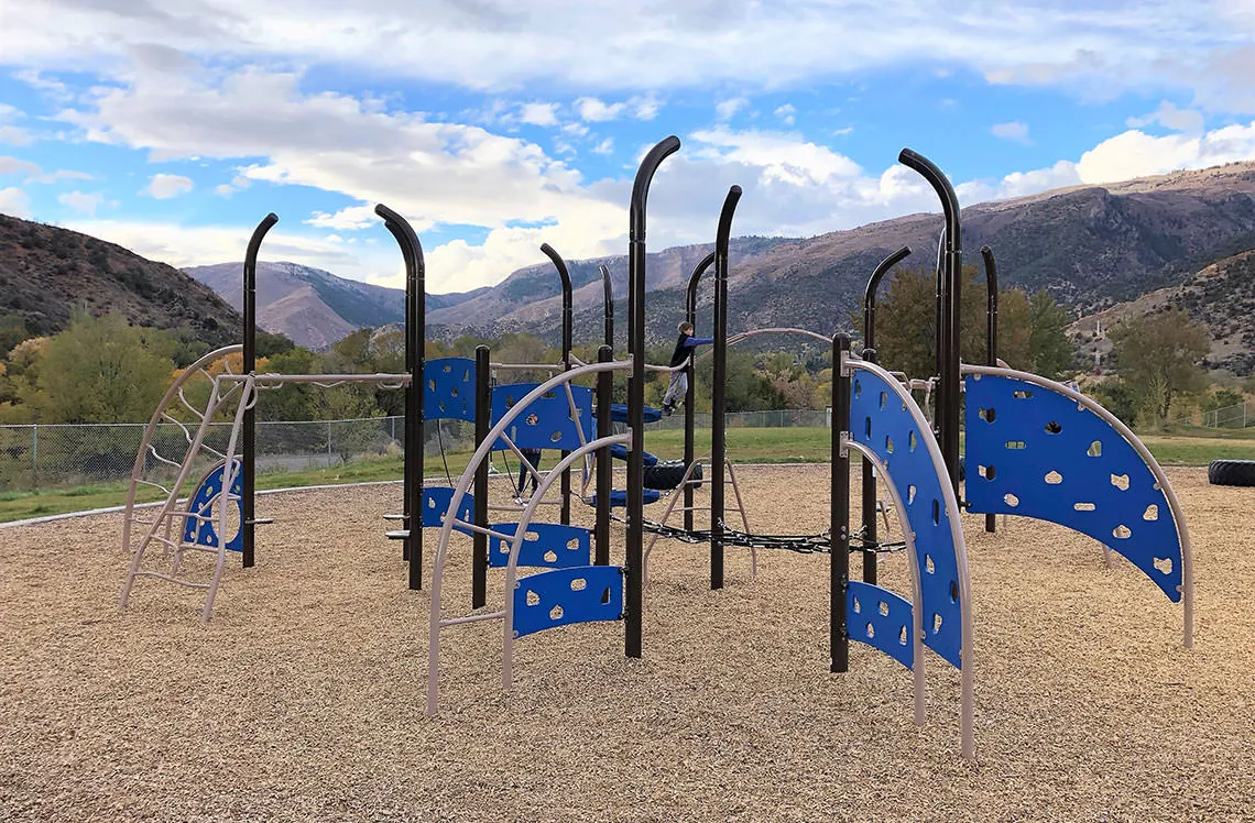 Build strength and coordination with climbing at Genwood Springs Elementary outdoor playground